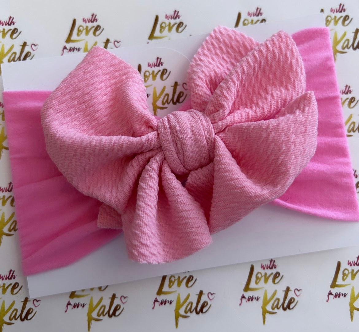 Pale pink textured knot baby headband