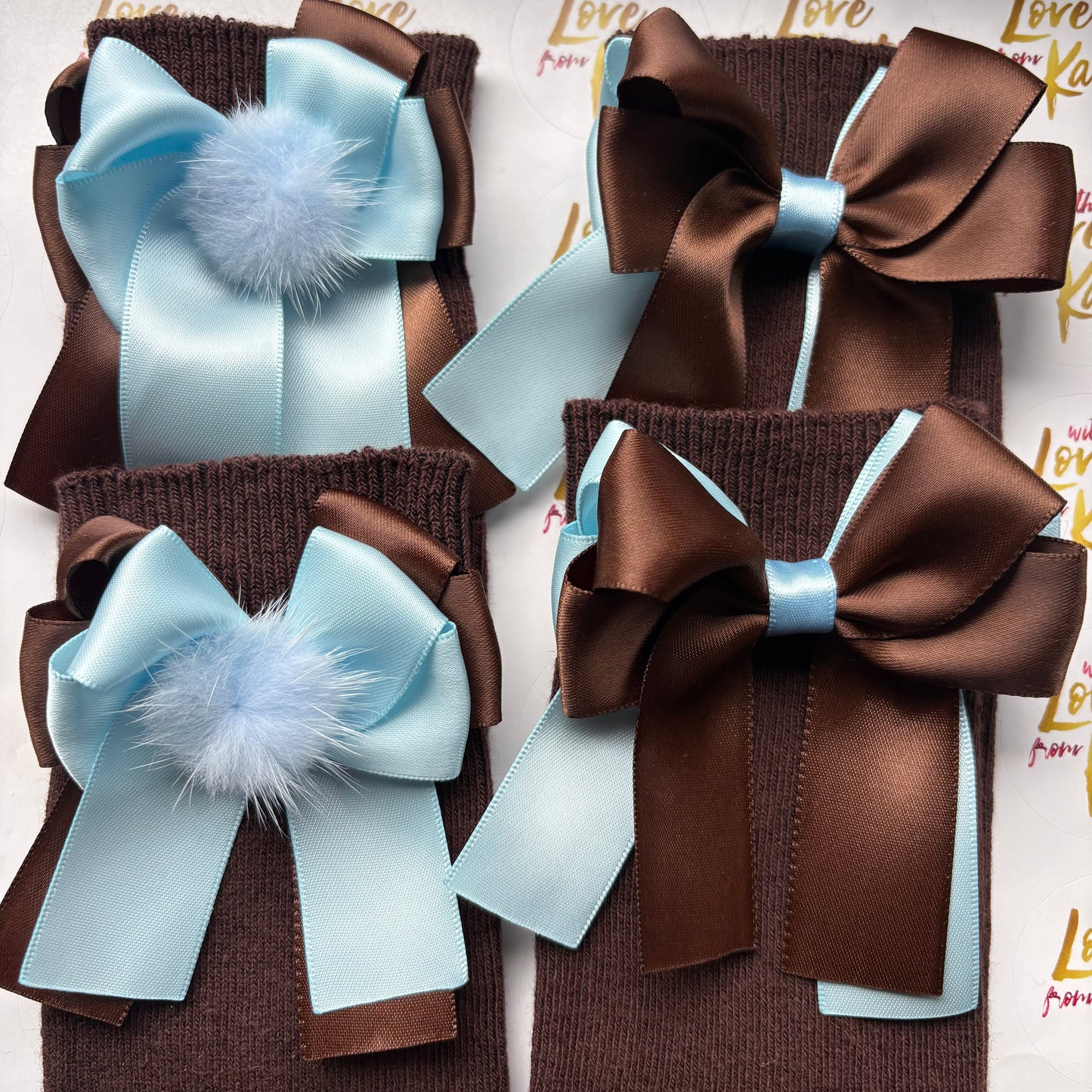 2 pairs of brown socks with brown & light blue long tail bows