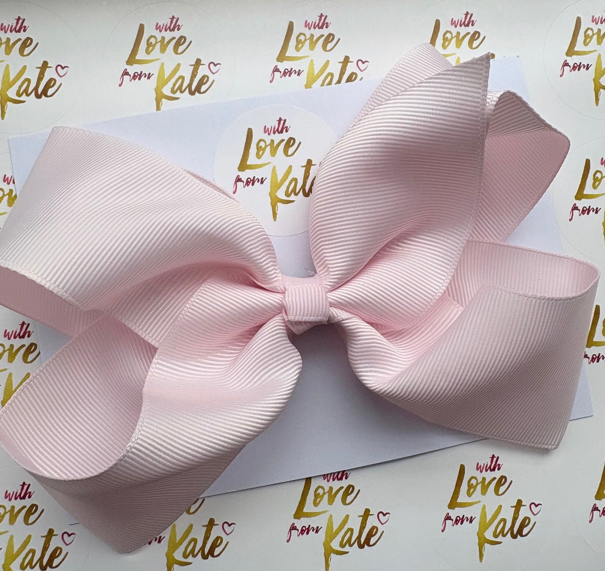 Pale pearl pink 6 inch boutique bow