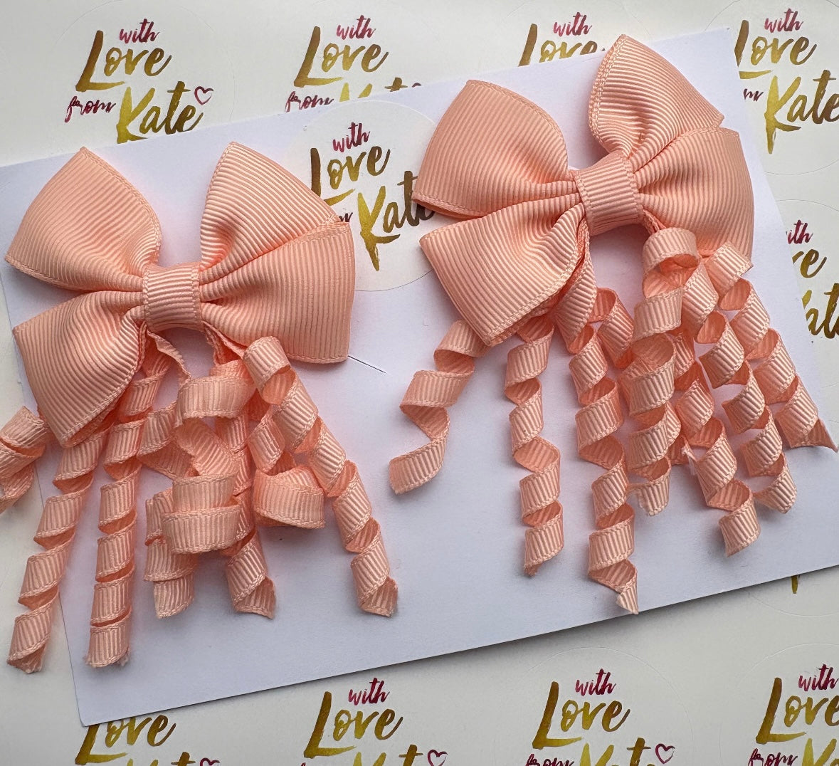 Peach Korker tails bow