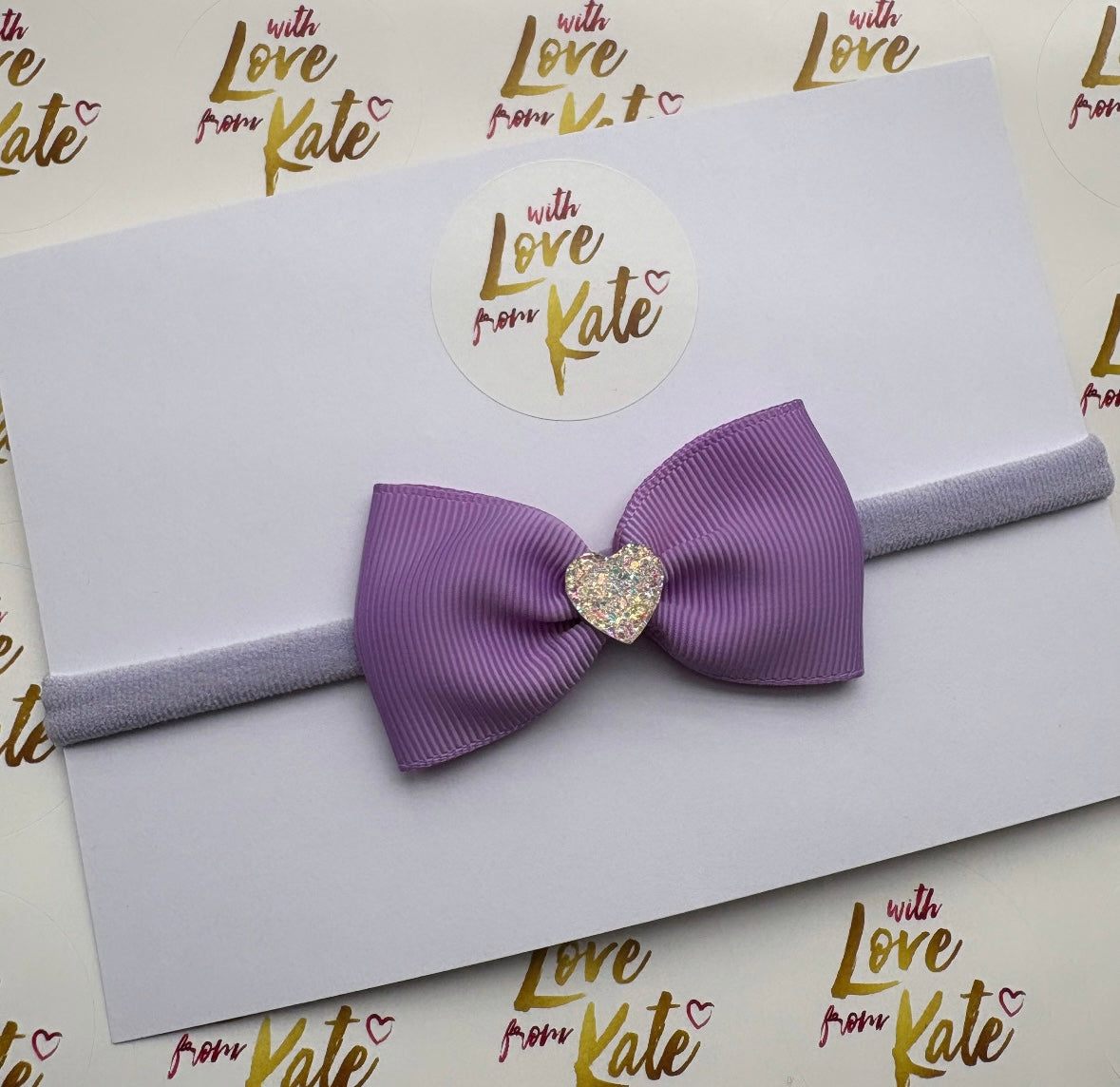 Lilac Pinch bow baby headband with heart centre