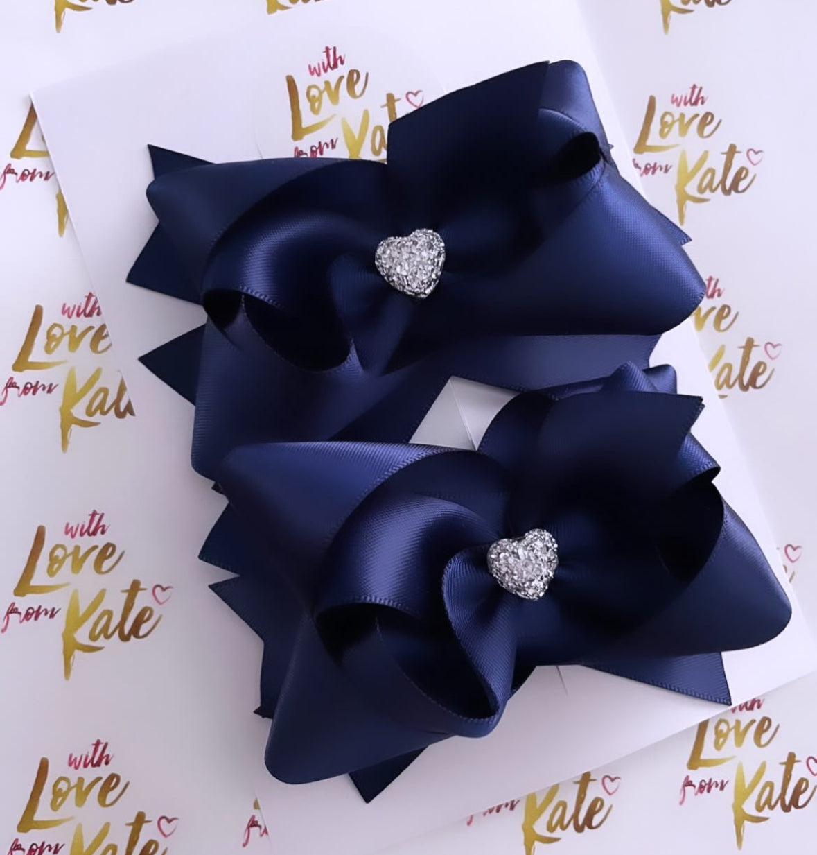 Navy Stacked bow with heart centre
