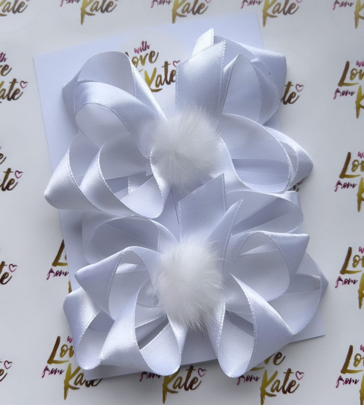 White satin double boutique bow with Pom Pom centre
