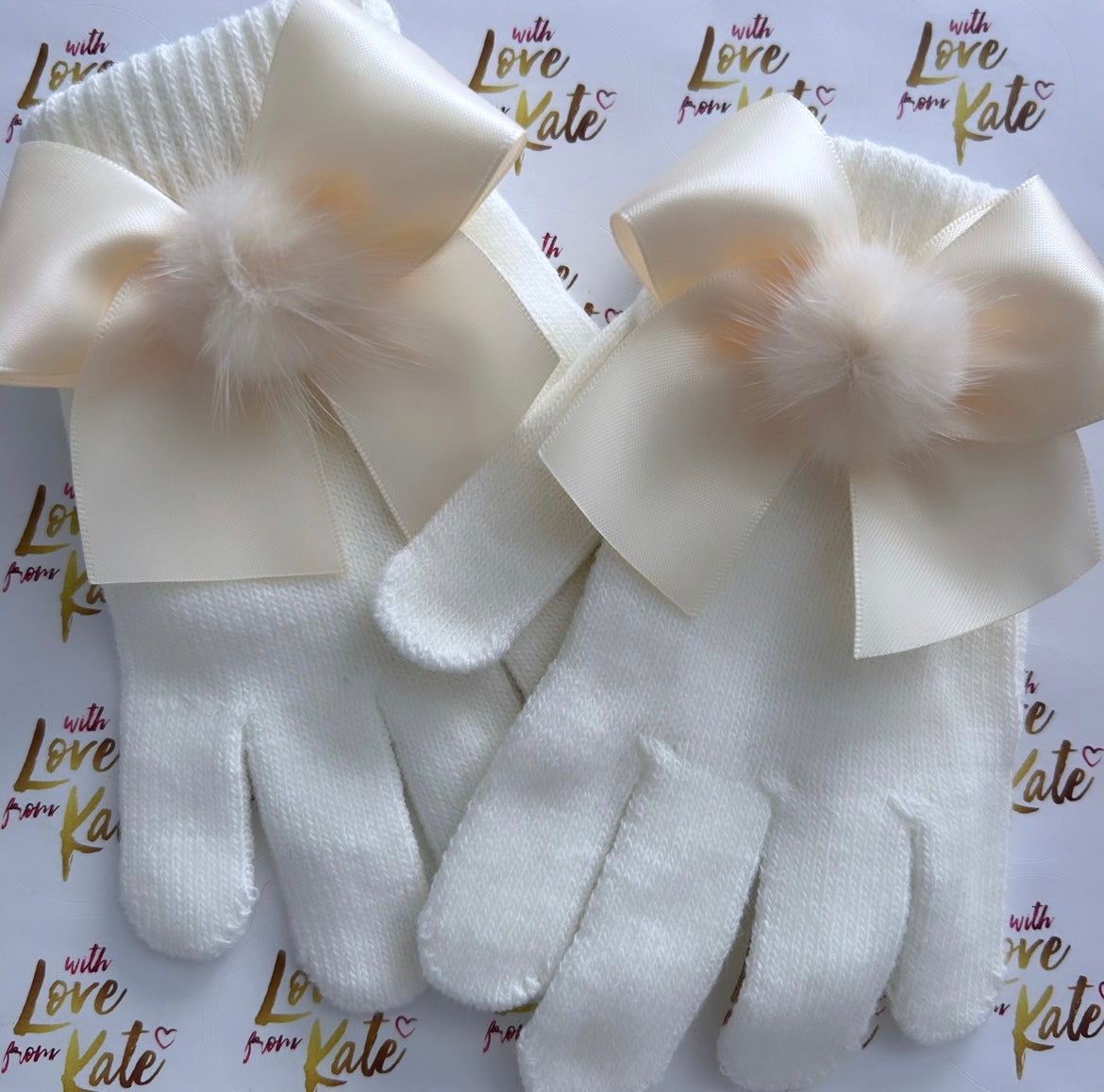 Cream gloves with satin bow and pom poms