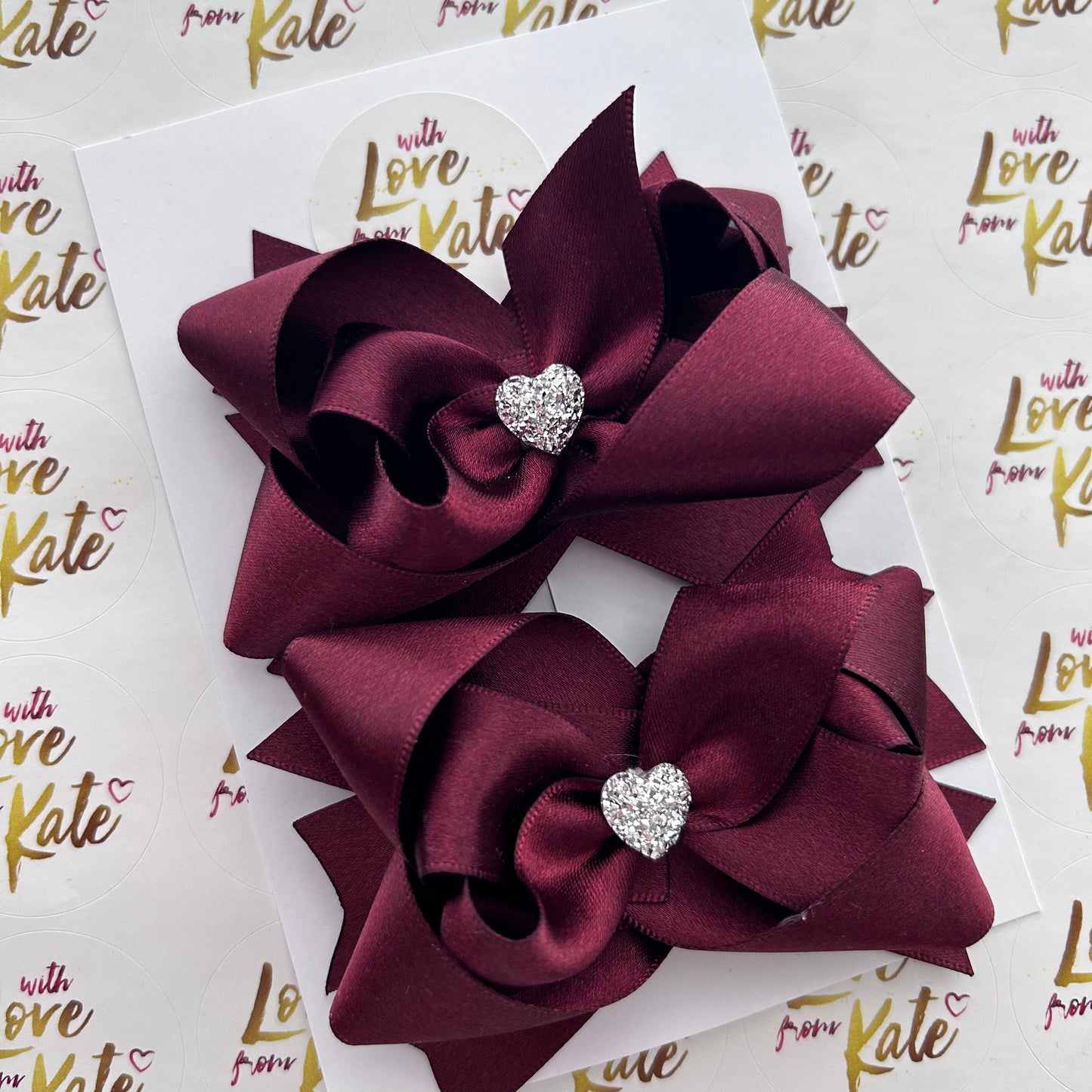 Maroon Stacked bow with heart centre