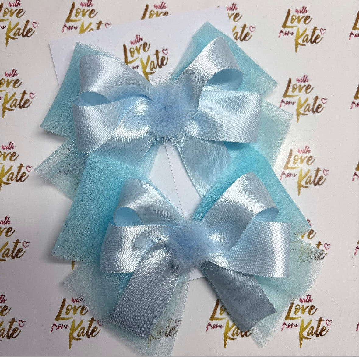 Baby blue tulle & satin bow with pom pom