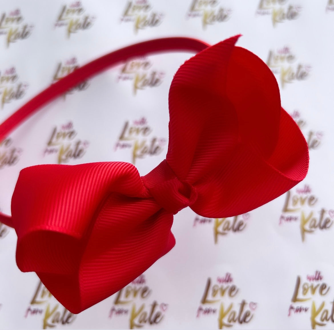 Red headband with boutique bow