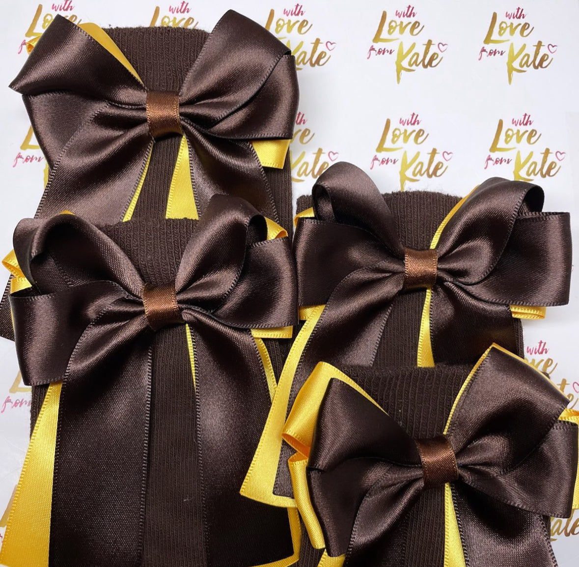 Brown socks with brown & yellow long tail bows