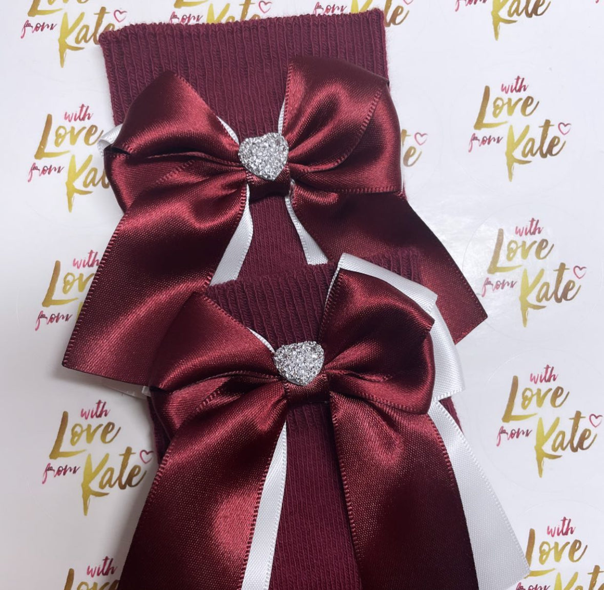 Maroon socks with maroon & white long tail bows