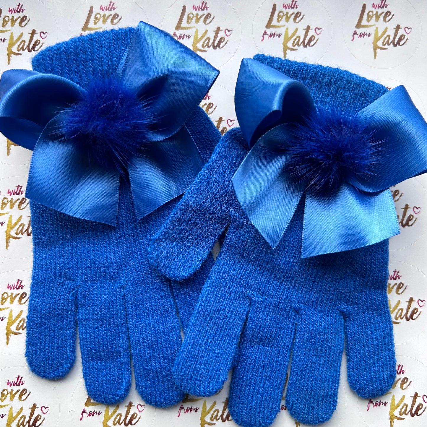 Royal blue gloves with satin bows and pom poms