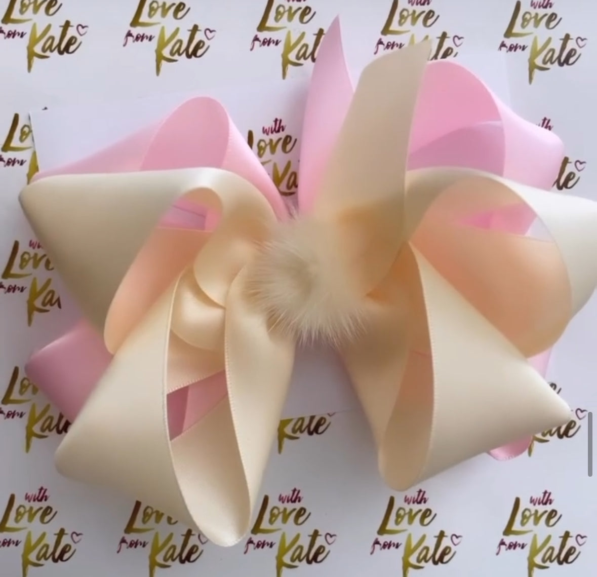 Large cream & pink double satin boutique bow with Pom Pom centre