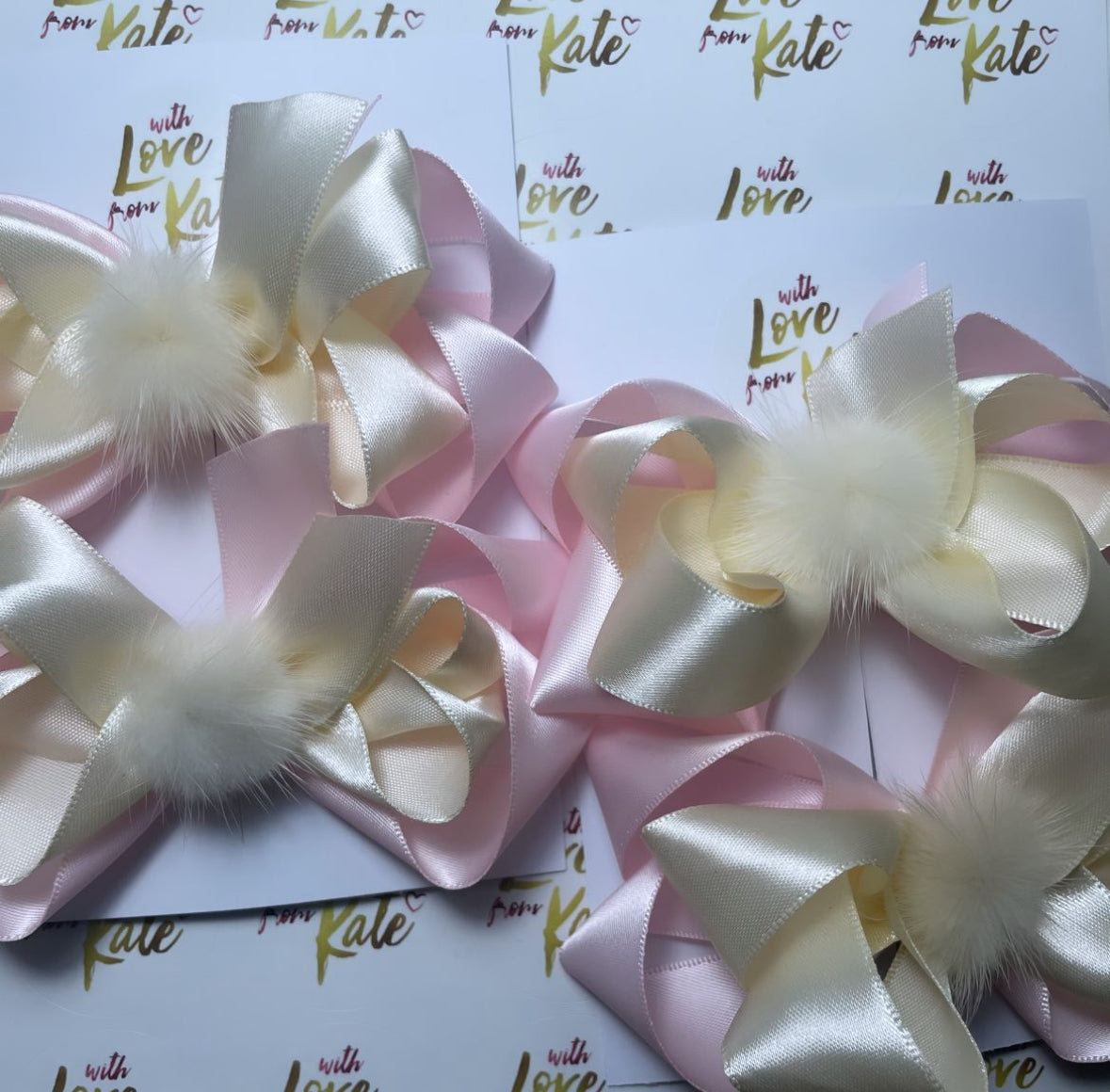 Cream & pink satin double boutique bow with Pom Pom centre