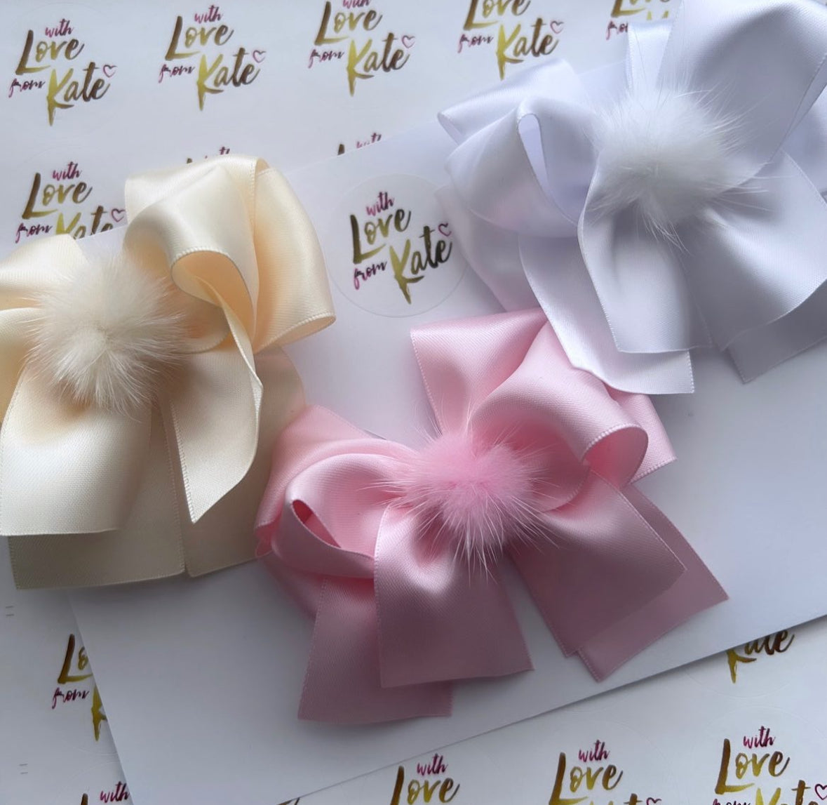3 x XL short tail bows with Pom Pom centres