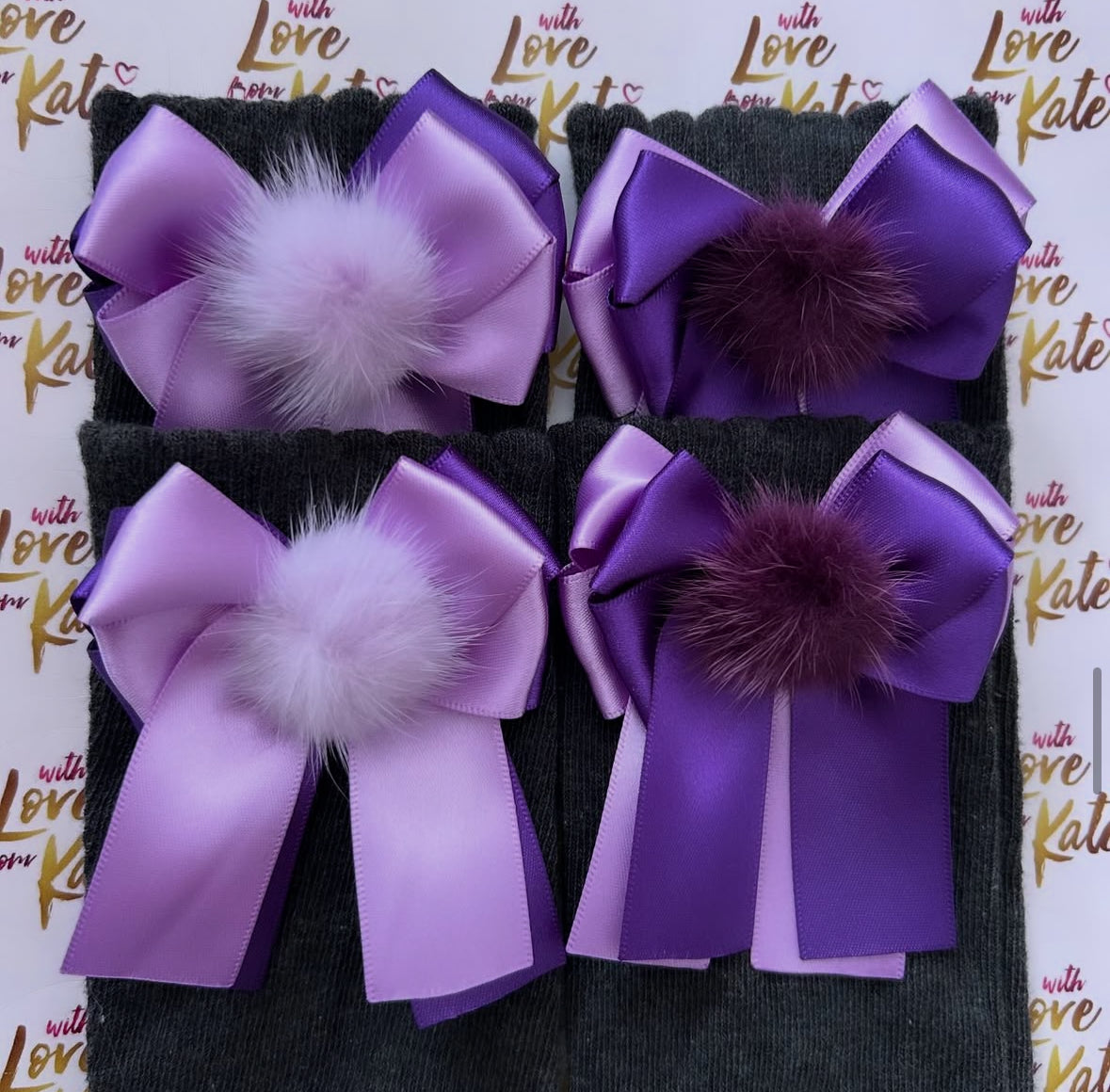 2 pairs of Purple & lilac long tail bow socks with pom poms