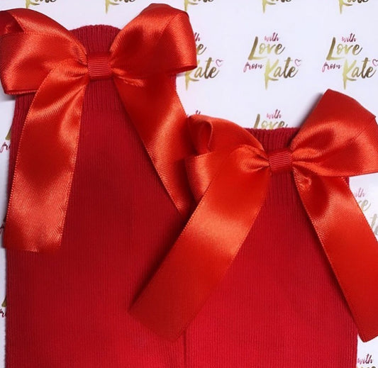 Red socks with red long tail bows