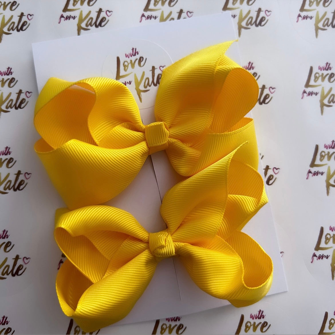 2 x yellow boutique bows