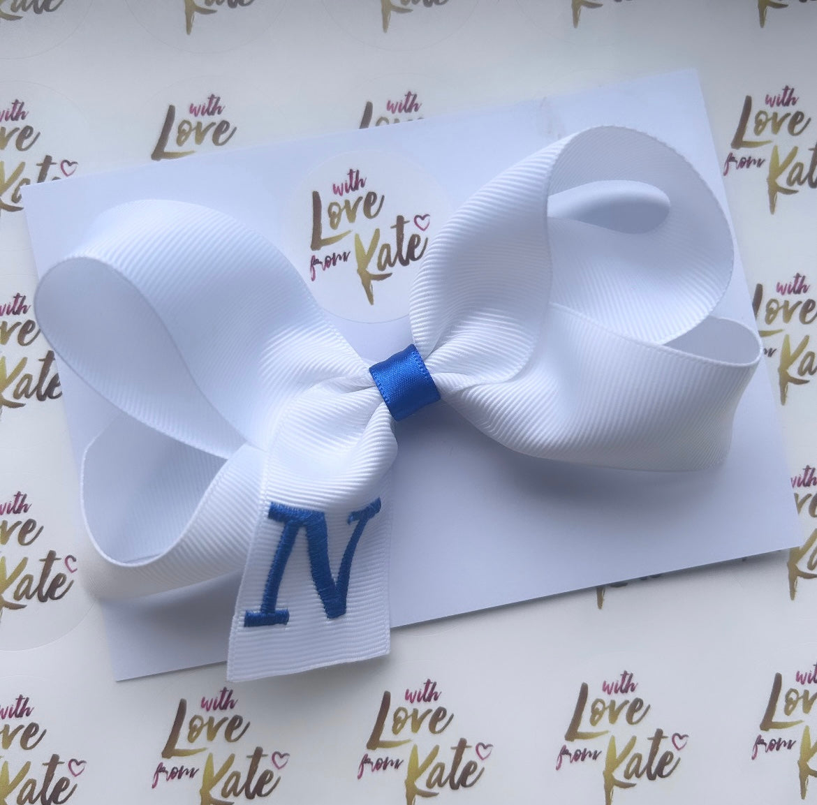 Embroidered ‘N’ boutique bow