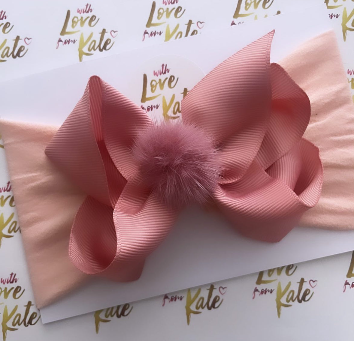 Dusky pink 4.5 inch boutique bow baby headband with Pom Pom centre