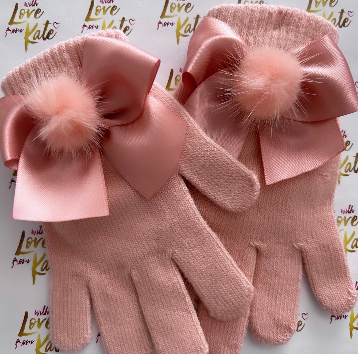 Dusky Pink Gloves with satin bows and pom poms.