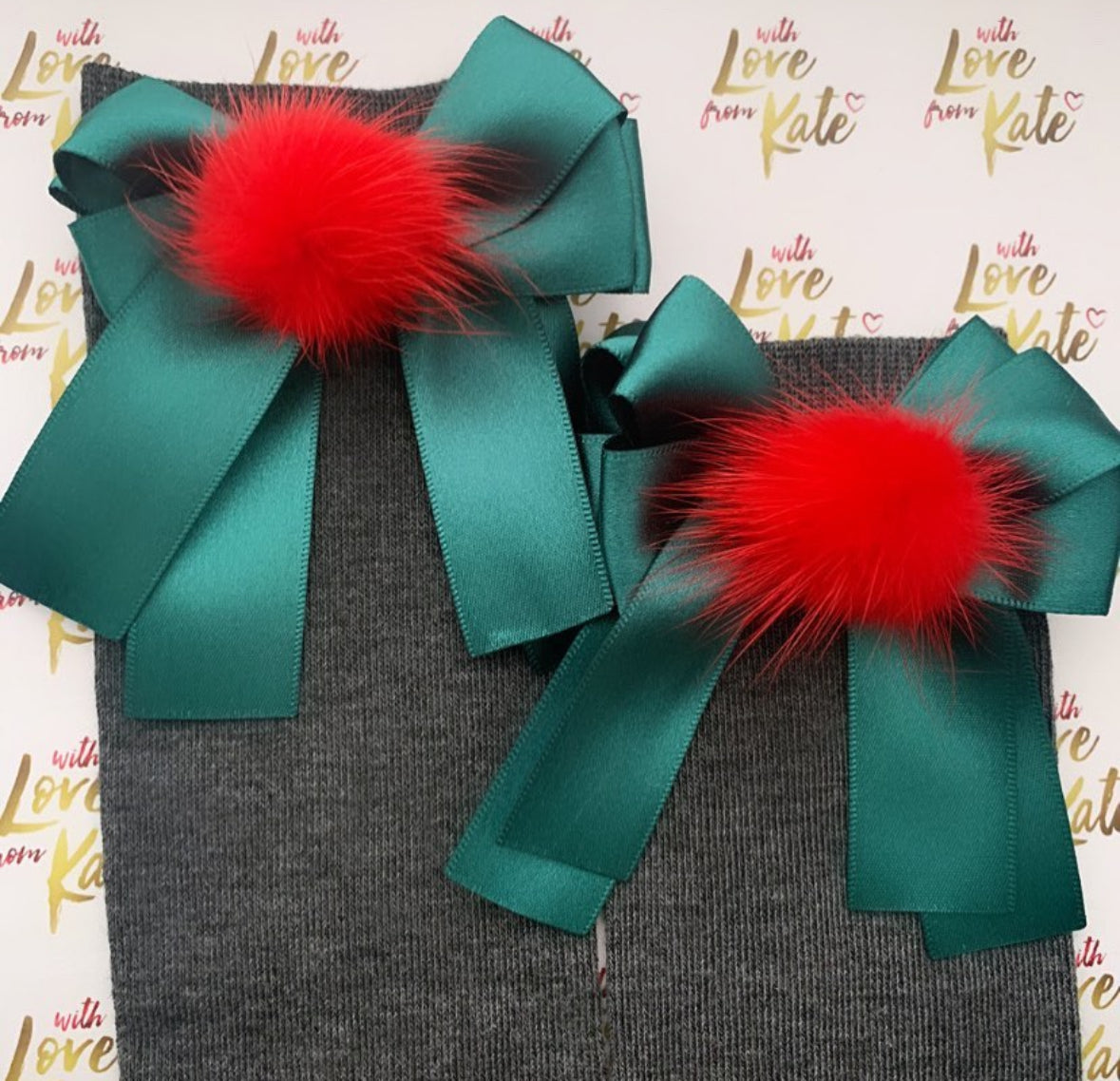 Green socks with green & red pom pom long tail bows