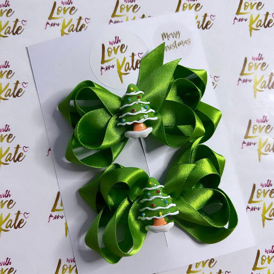 A pair of Christmas Tree double boutique bows