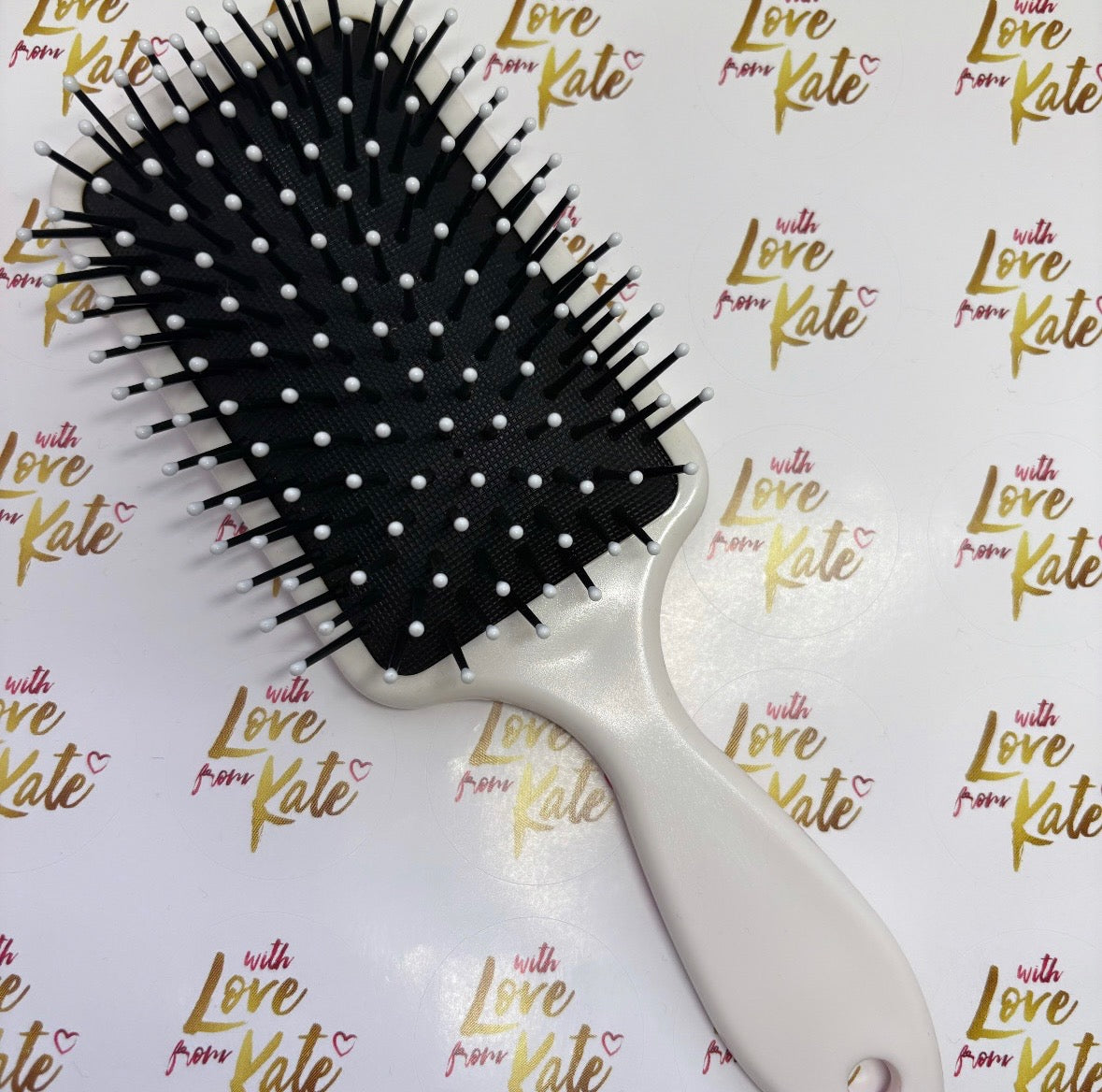 Bow print paddle brush