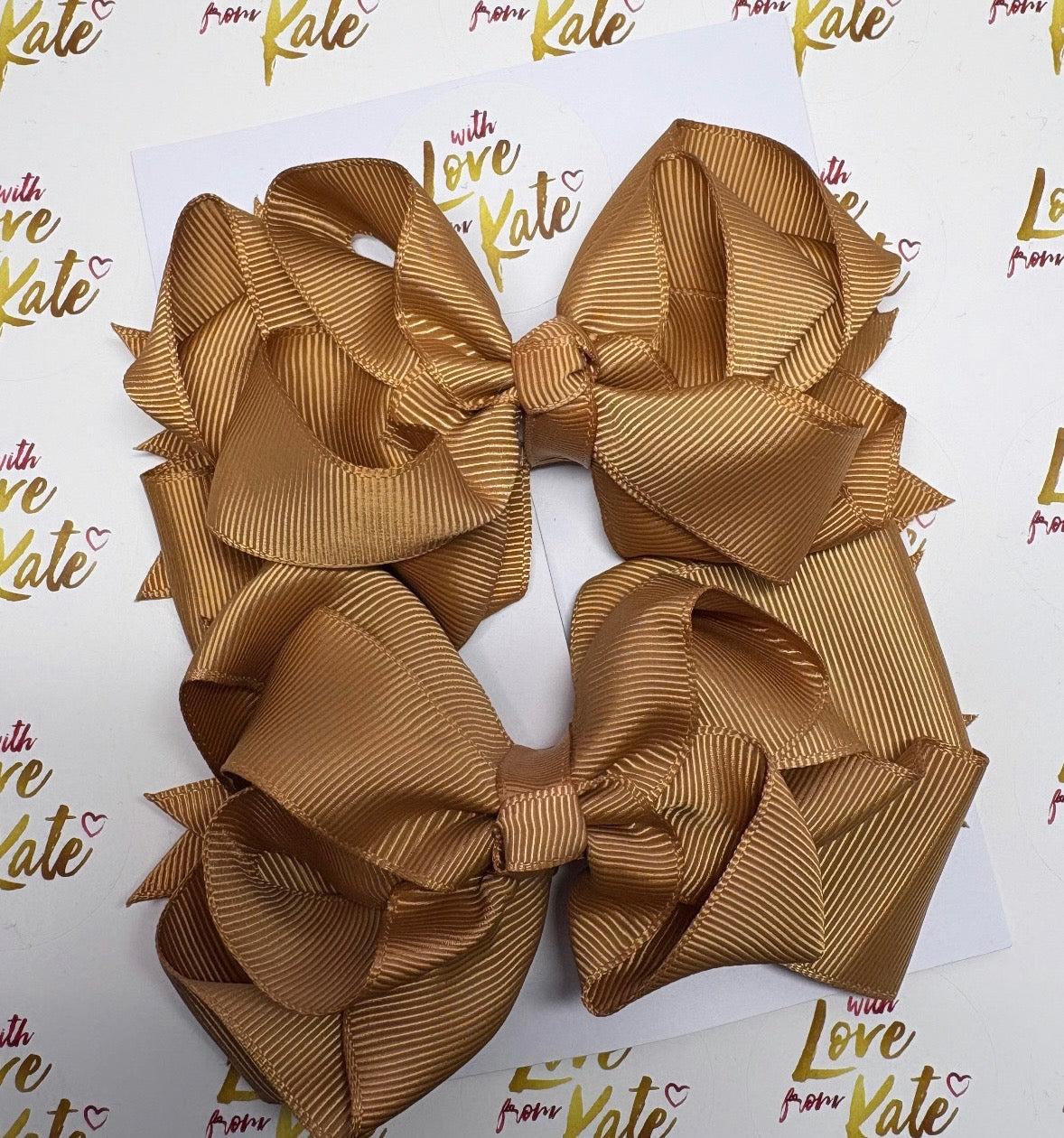 Camel double boutique stacked bow