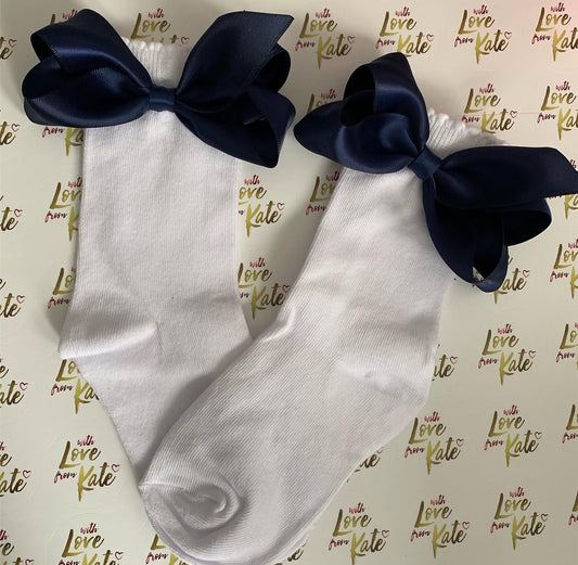 White socks with navy boutique bows