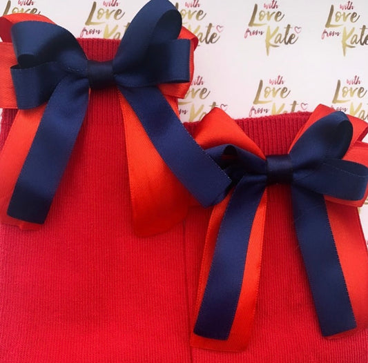 Red socks with navy & red long tail bows