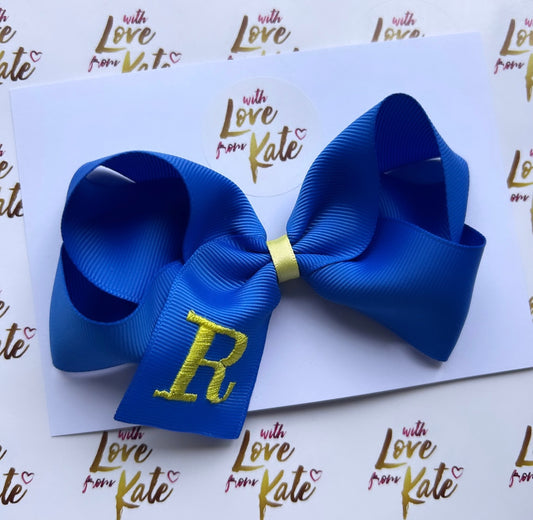 Royal blue embroidered ‘R’ boutique bow