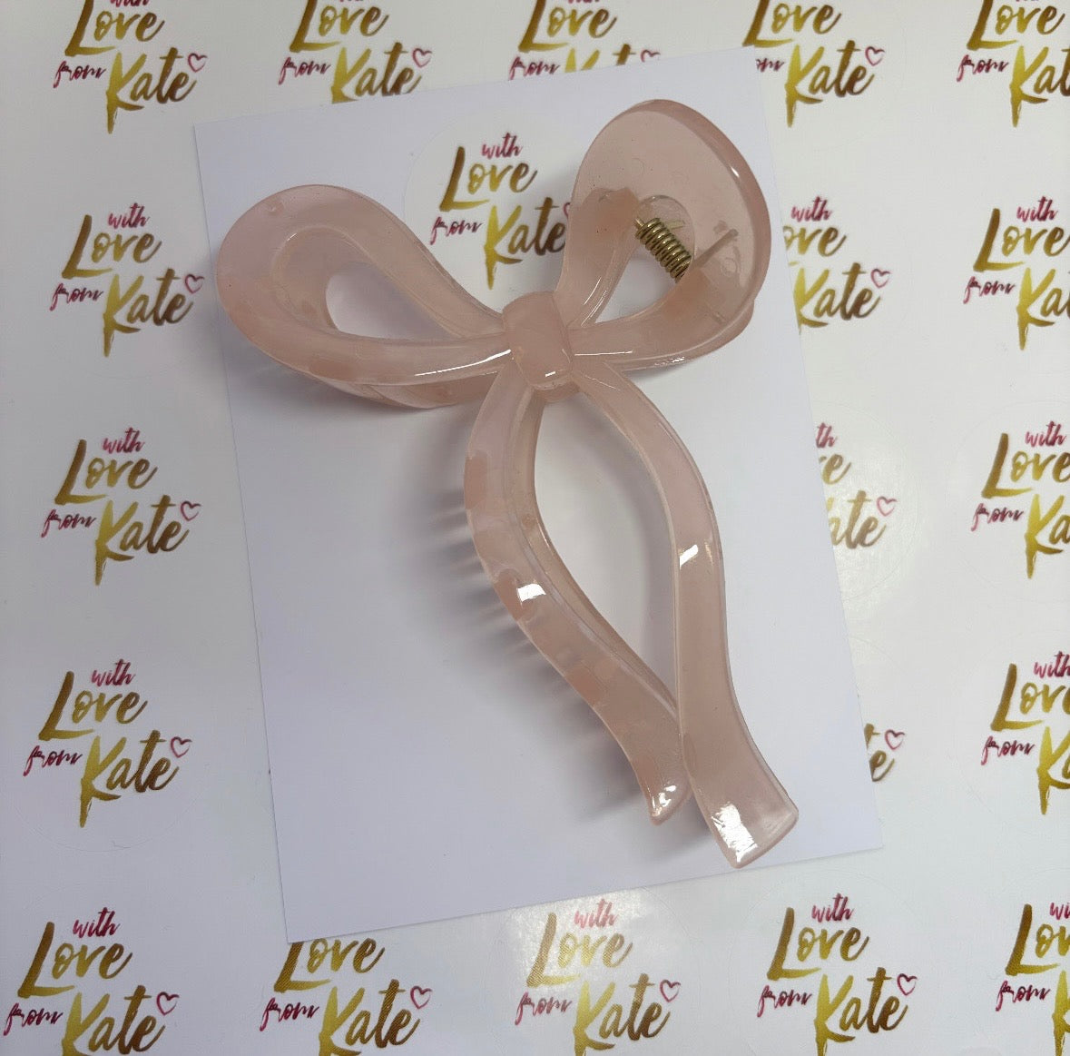 Clear pink ribbon bow claw clip