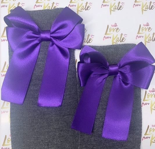 Grey socks with purple long tail bows