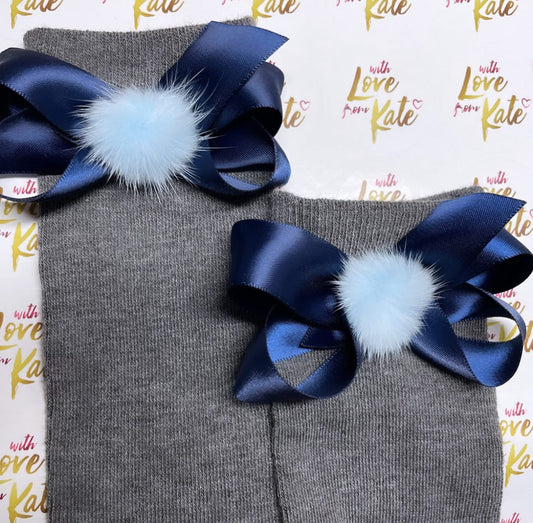 Grey socks with navy boutique bows with pom poms