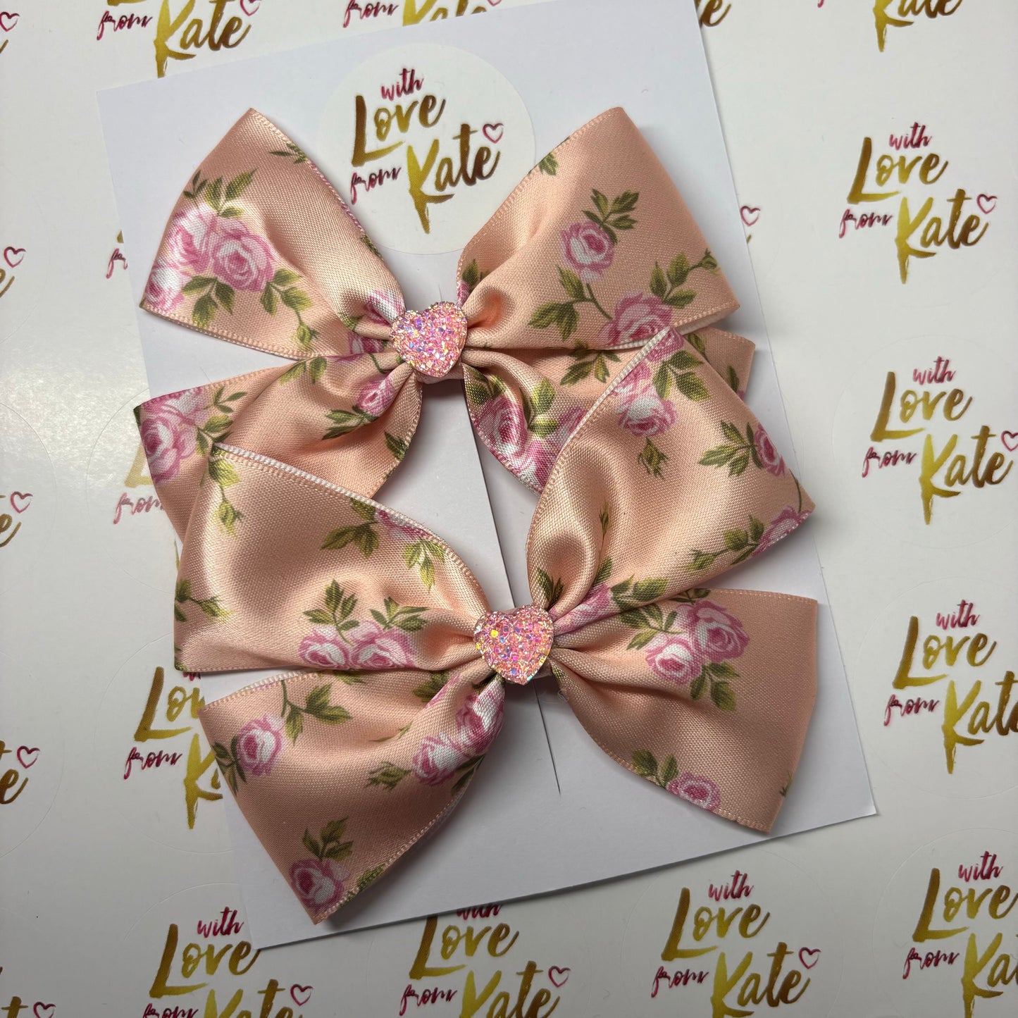 Peach floral satin double Tux bow