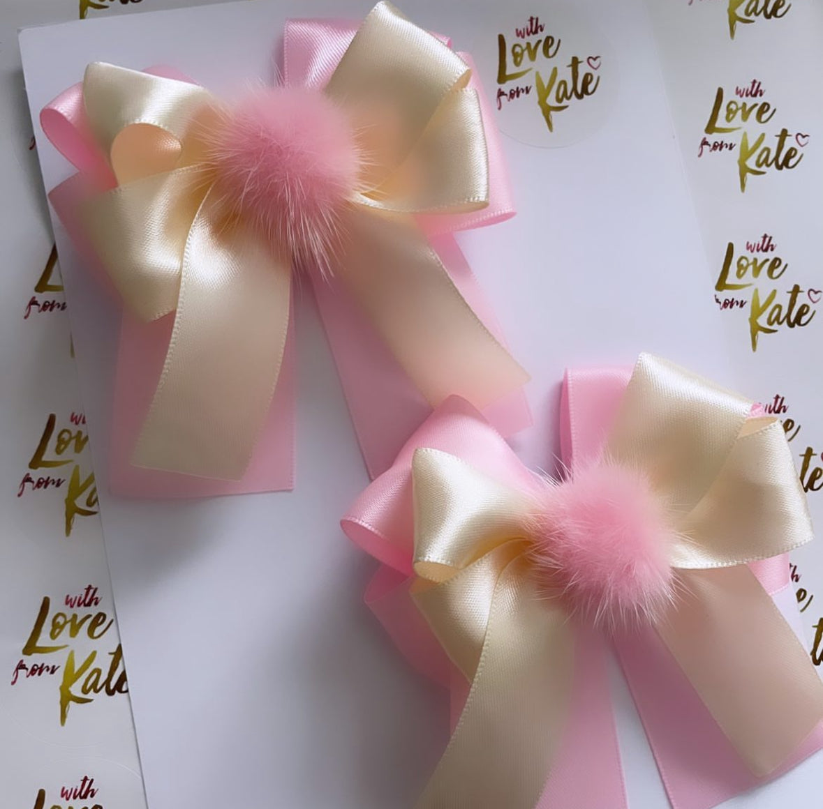 Pink & cream XL short tail bow with Pom