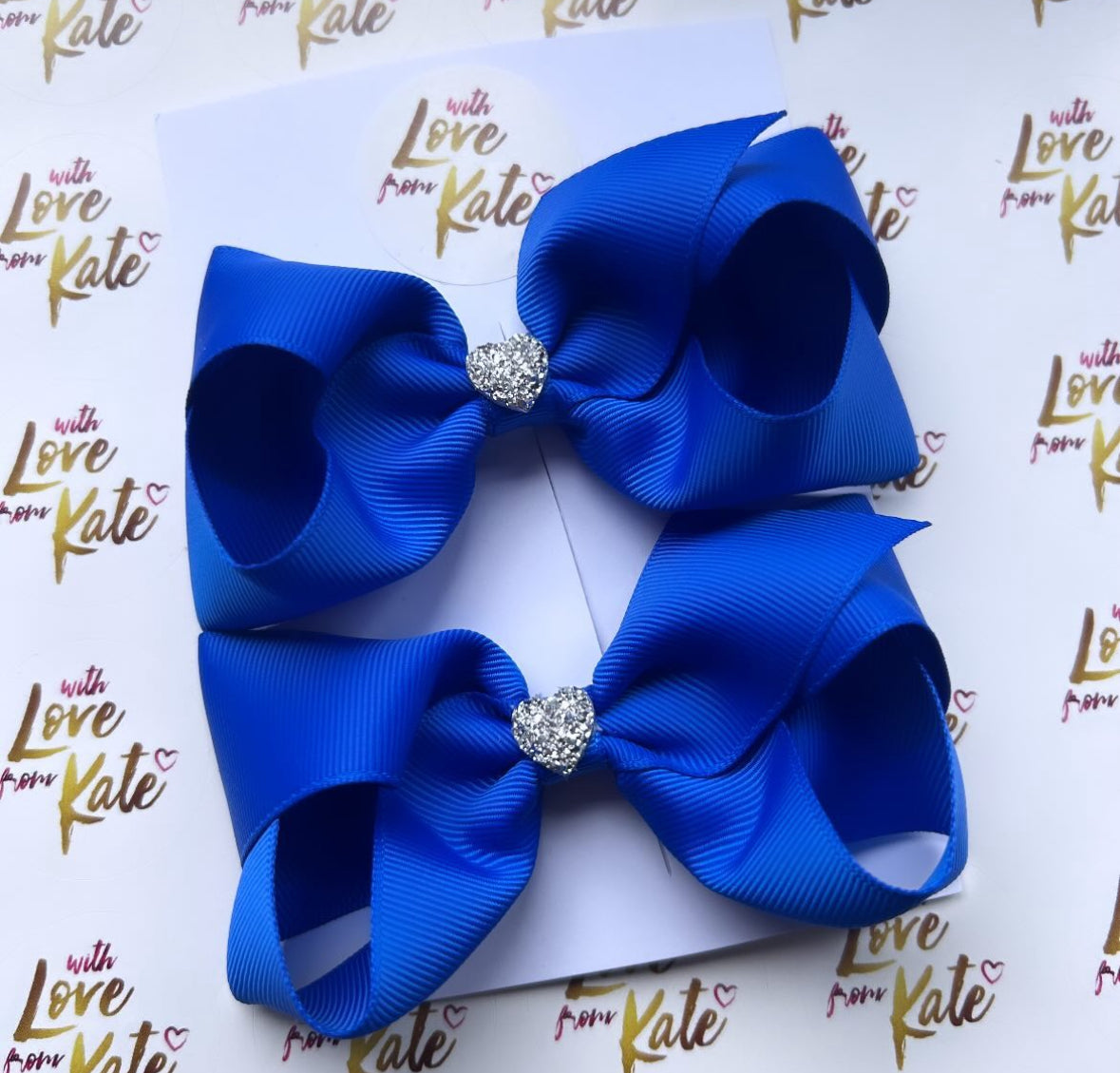 4.5 inch royal blue boutique bow with heart centres