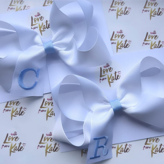 White with light blue embroidered initial boutique bow